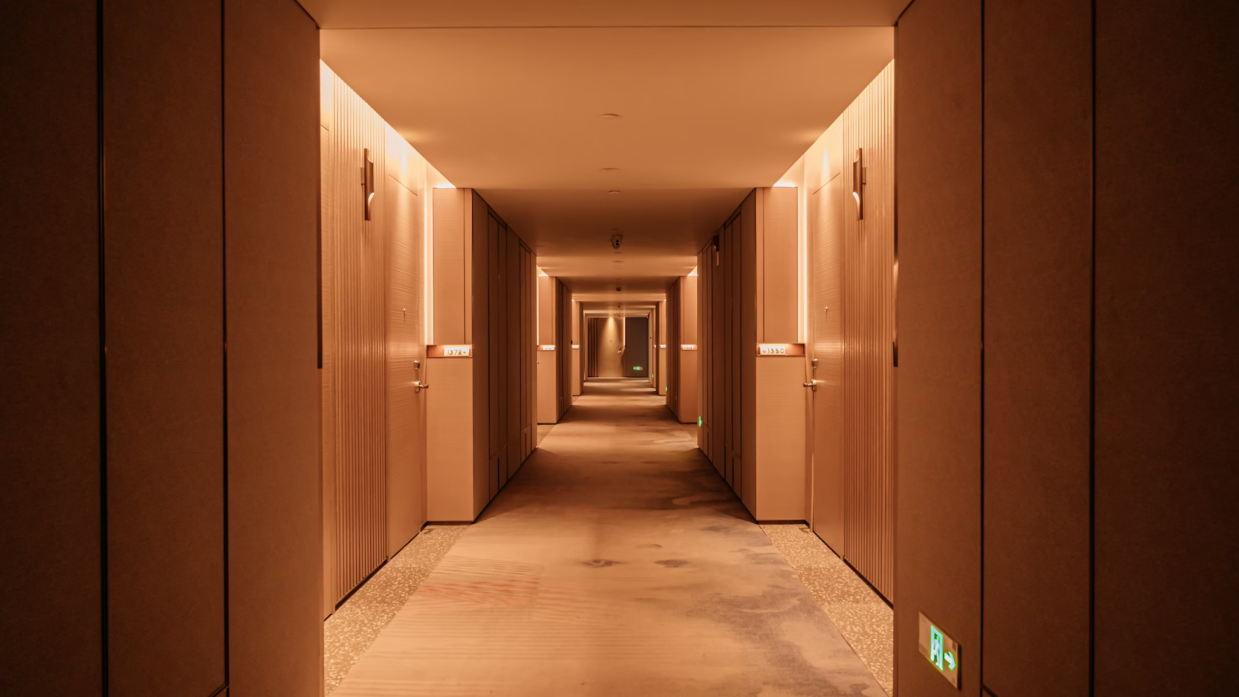 Elegant hotel corridor with warm lighting