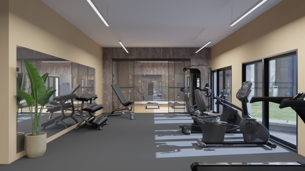 A sophisticated hotel fitness area with premium strength and cardio gym equipment. 